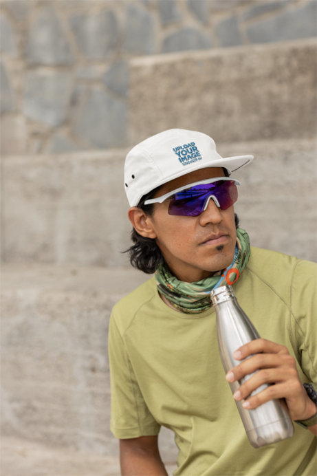 Yupoong Panel Cap Mockup Featuring a Man Taking a Rest From Jogging