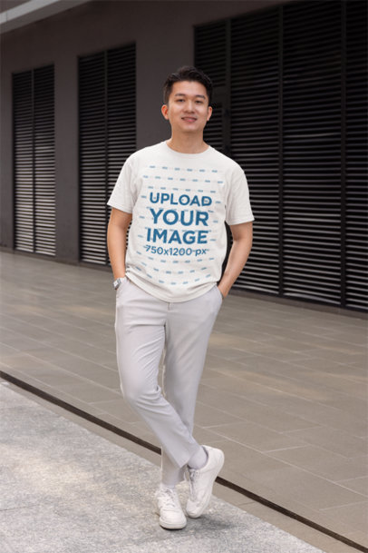 Gildan T-Shirt Mockup of a Smiling Man Posing With His Hands in His Pockets