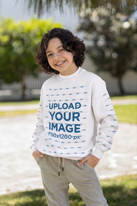Gildan Sweatshirt Mockup of a Happy Boy Posing in a Backyard