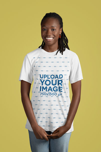 Mockup of a Happy Woman Wearing a Round-Neck Bella Canvas T-Shirt in a Studio