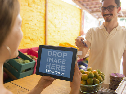 Mockup Template of Young Woman Using iPad at Small Market