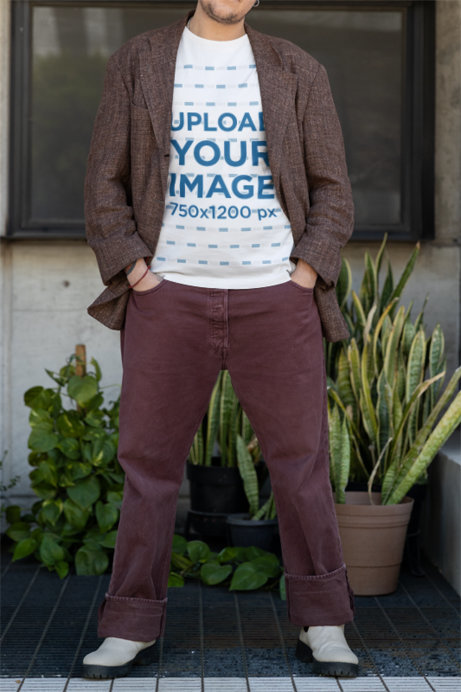 Mockup of a Person Wearing a Bella Canvas T-Shirt Under a Stylish Blazer