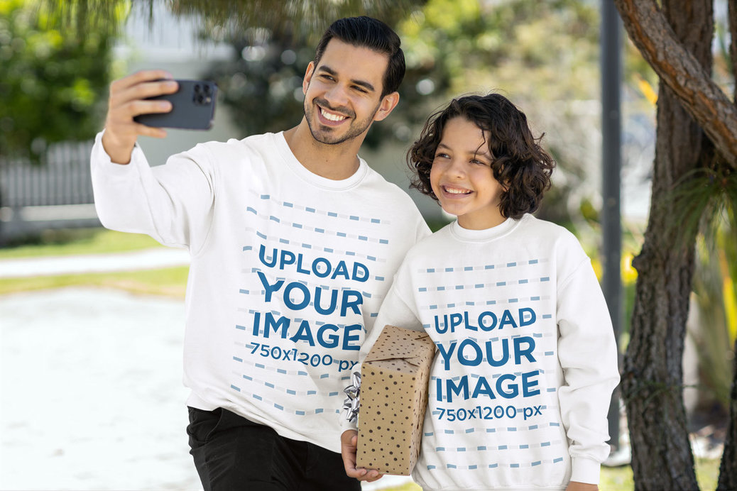 Gildan Sweatshirt Mockup Featuring a Happy Man Taking a Selfie With His Son for Father's Day