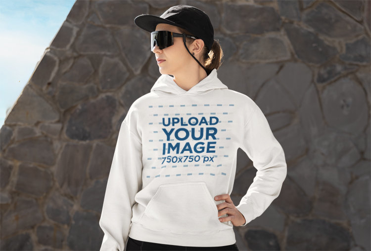 Mockup of a Female Runner Wearing a Pullover Hoodie from Gildan
