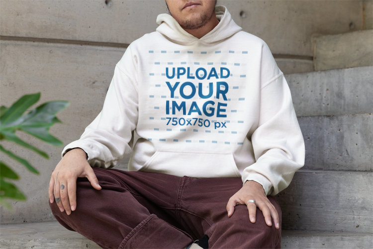 Mockup of a Person Wearing a Pullover Hoodie from Gildan 