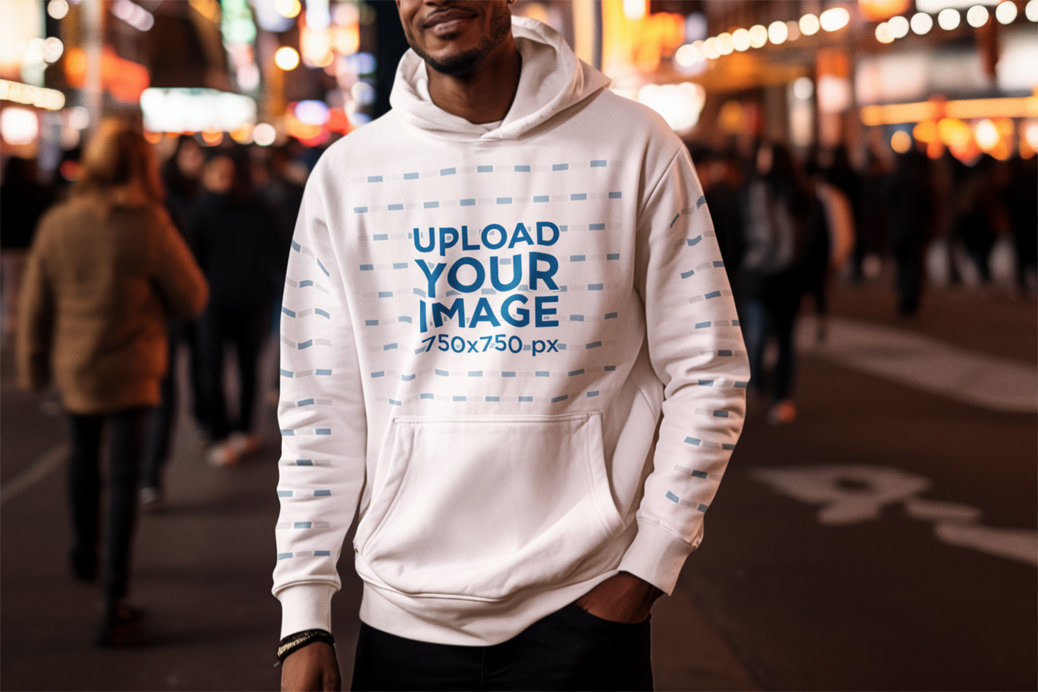 Mockup of a Man Wearing a Hoodie with Customizable Sleeves on a Crowded Street