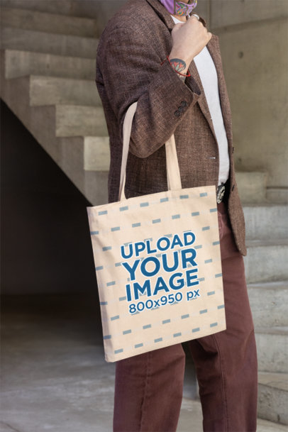 Mockup of Someone Carrying a Sublimated Tote Bag in Front of a Staircase m40030