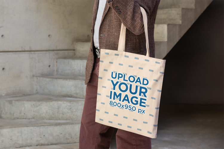 Mockup of a Stylish Person Carrying a Sublimated Tote Bag