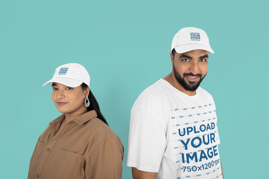 Dad Hat and T-Shirt Mockup Featuring a Man and Woman Standing in a Studio
