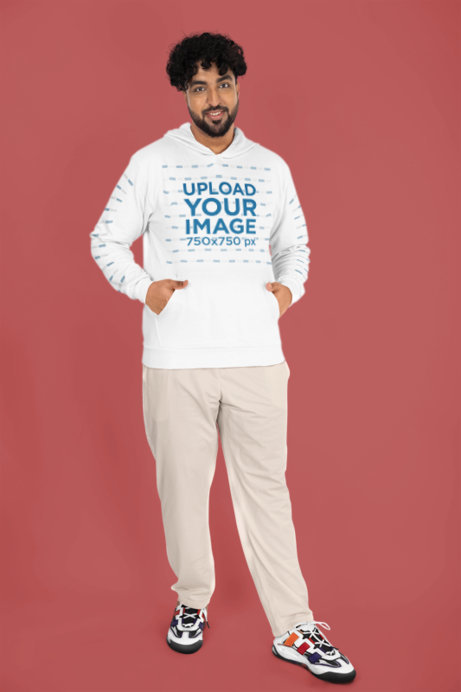 Gildan Pullover Hoodie Mockup Featuring a Happy Bearded Man in a Studio