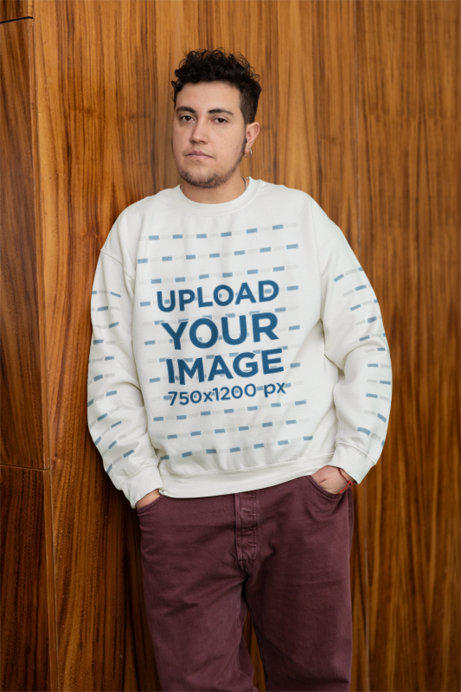 Gildan Sweatshirt Mockup of a Person Leaning Against a Wooden Wall