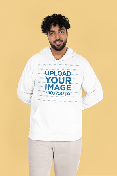Gildan Pullover Hoodie Mockup of a Smiling Bearded Man Standing Against a Colorful Backdrop