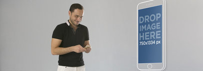 Man Using his iPhone 6 Over Gray Backdrop and Large Screenshot