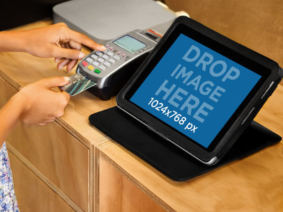Cashier Making a Sales Transaction Featuring an iPad