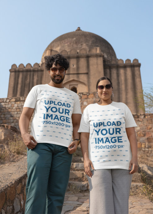 Mockup of a Man and a Woman Wearing Matching Rounded-Neck Tees 