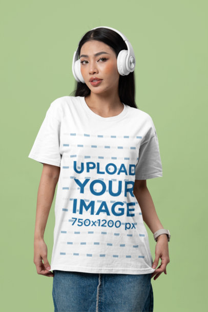 Bella Canvas T-Shirt Mockup Featuring a Serious Woman Posing With White Headphones
