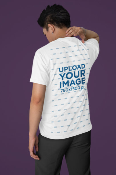 Back-View Bella Canvas T-Shirt Mockup Featuring a Man Posing With a Hand on His Neck