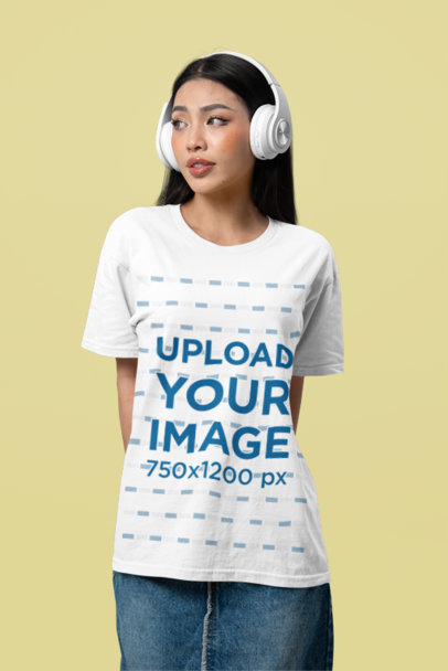 Bella Canvas T-Shirt Mockup of a Woman With Headphones Posing in a Studio