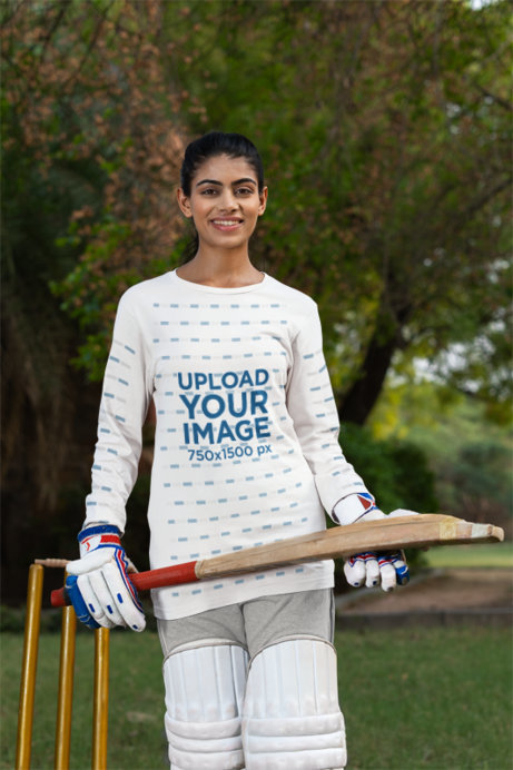Bella Canvas Long Sleeve Tee Mockup of a Smiling Woman Wearing Cricket Equipment