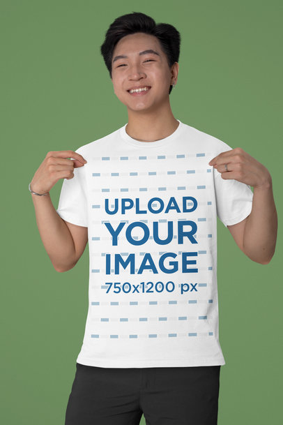 Bella Canvas T-Shirt Mockup of a Cheerful Man Posing Against a Studio Background