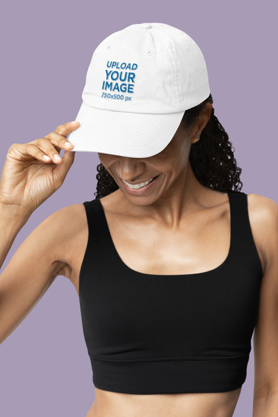 Otto Cap Dad Hat Mockup Featuring a Happy Woman Posing With a Dad Hat and a Wellness-Styled Outfit m40197
