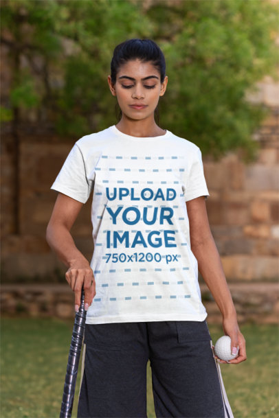 Round-Neck T-Shirt Mockup Featuring a Woman With a Cricket Stick and a Ball m39947