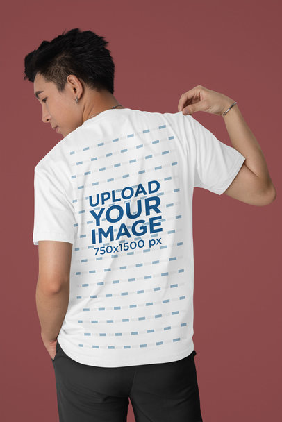 Back-View Bella Canvas Mockup of a Man Posing in a Studio Wearing a T-Shirt m40243