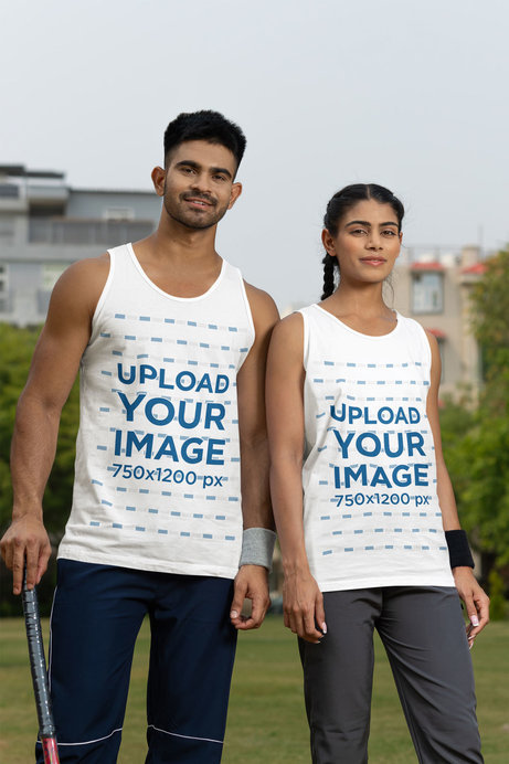 Mockup of Two Cricket Players Wearing Matching Tank Tops on a Field
