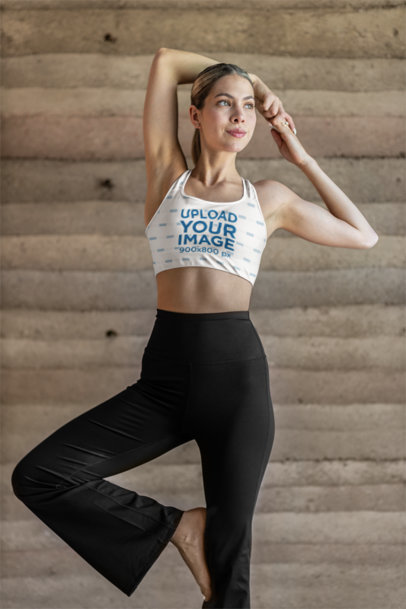 Sports Bra Mockup of a Woman Stretching Her Arms With an Activewear Outfit m40079