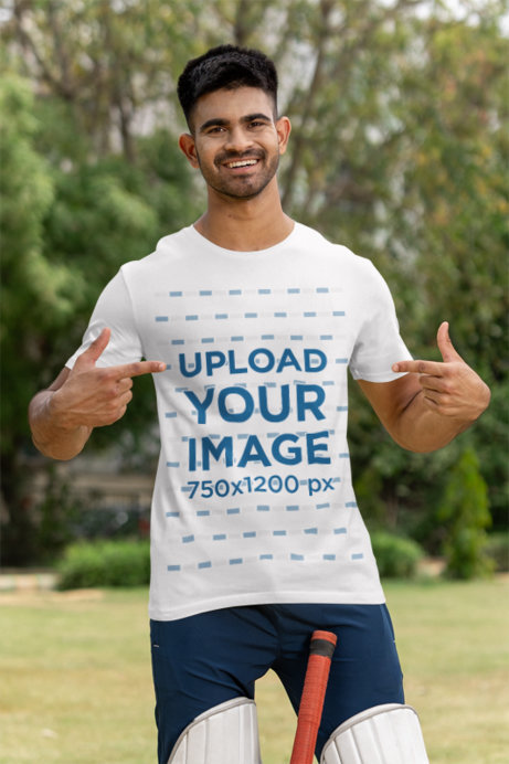 Mockup of a Smiling Cricket Player Pointing at His Crewneck T-Shirt