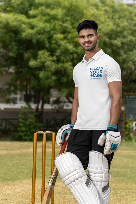 Polo Shirt Mockup of a Man Wearing Cricket Equipment on a Field