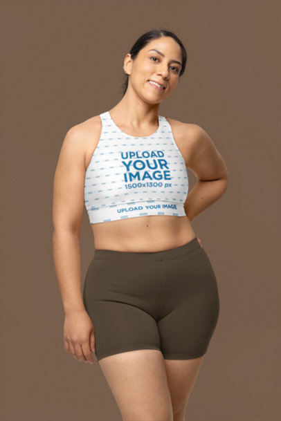 Padded Sports Bra Mockup of a Smiling Woman Standing in a Studio