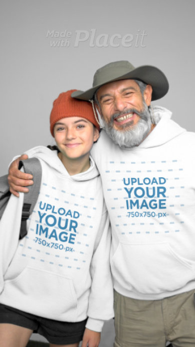 Gildan Hoodie Video of Happy Senior Man Hugging a Girl in a Camping Setting