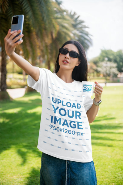 Bella Canvas Mockup Featuring a Woman With a T-Shirt and a Coffee Mug Taking a Selfie m40214