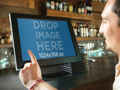 Desktop Mockup Featuring a Bartender Entering an Order at the Bar