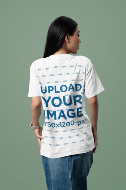 Back-View Bella Canvas Tee Mockup of a Woman Posing Against a Colorful Backdrop