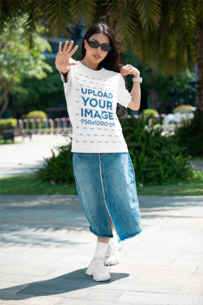 Bella Canvas Round-Neck T-Shirt Mockup of a Stylish Woman Standing in the Street