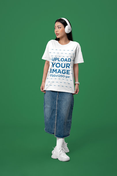 Bella Canvas T-Shirt Mockup Featuring a Serious Woman With Headphones Standing in a Studio