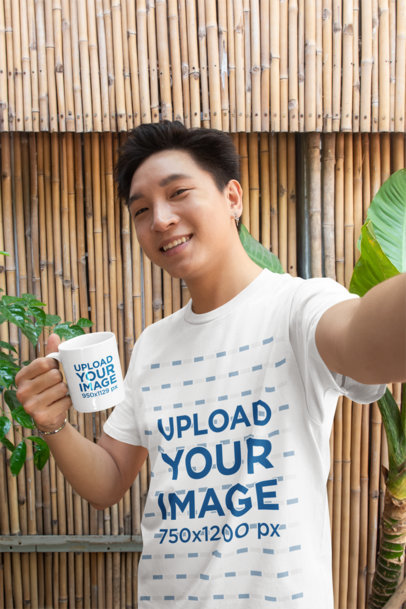 Bella Canvas T-Shirt Mockup Featuring a Cheerful Man Taking a Selfie While Holding a Coffee Mug m40230