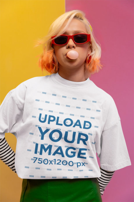 Oversized Tee Mockup of a Woman Making a Bubble Gum in a New Pop Wave-Inspired Setting