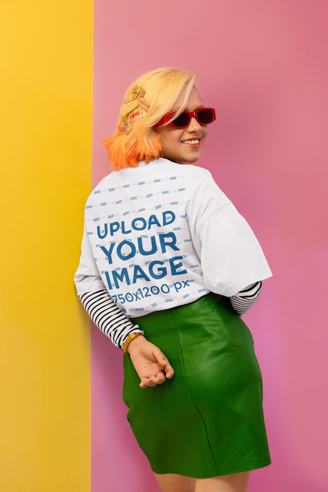Back-View Oversized Tee Mockup Featuring a Smiling Woman in a New Pop Wave-Inspired Setting