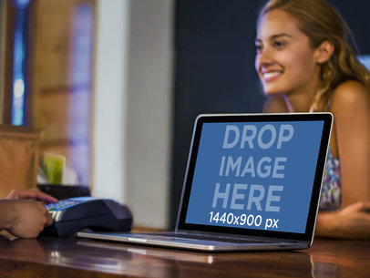 Point of Sale Transaction Featuring a Pretty Young Lady and a Macbook Pro