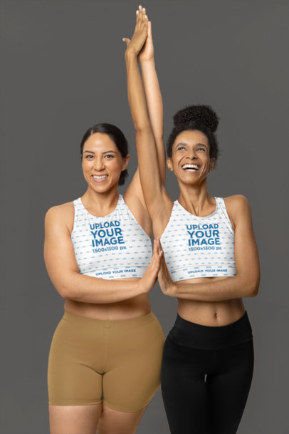 Fully Lined Sports Bra Mockup Featuring Two Happy Fitness Women in a Studio