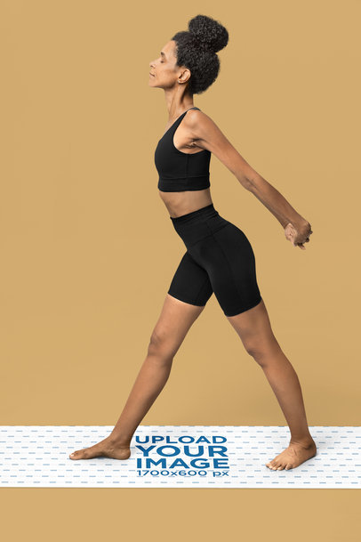 Wellness-Themed Mockup of a Fitness Woman Stretching in a Yoga Mat