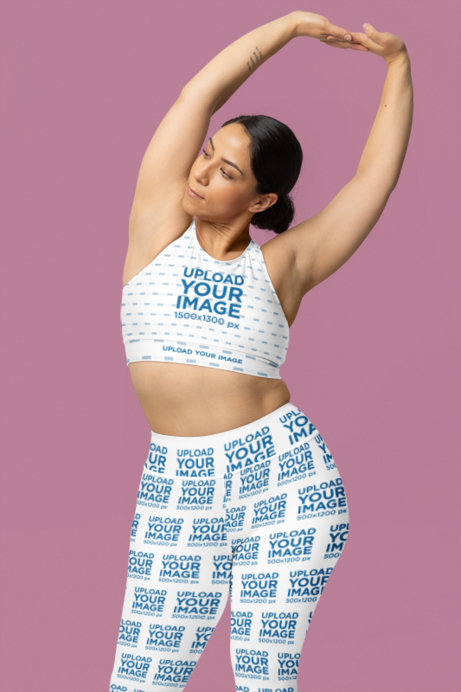 Fully Lined Sports Bra Mockup Featuring a Woman in High-Waisted Yogga Leggings Stretching Her Arms
