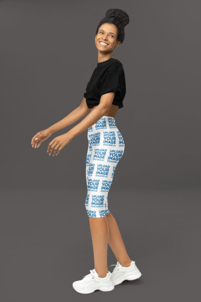 Yoga Capri Leggings Mockup of a Smiling Woman Posing Against a Colorful Backdrop