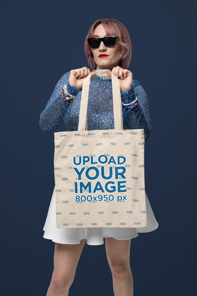 Mockup of a Cool Woman in a Swift Fandom Outfit Carrying a Tote Bag
