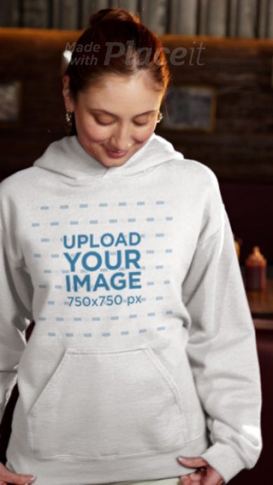 Gildan Hoodie Video Featuring a Happy Woman Celebrating a Sports Match With Beer