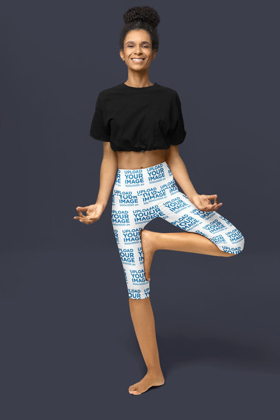 Yoga Capri Leggings of a Smiling Woman Standing in a Yoga Position