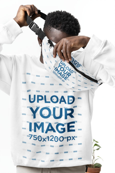 Sweatshirt Mockup Featuring a Man Putting On a Fanny Pack